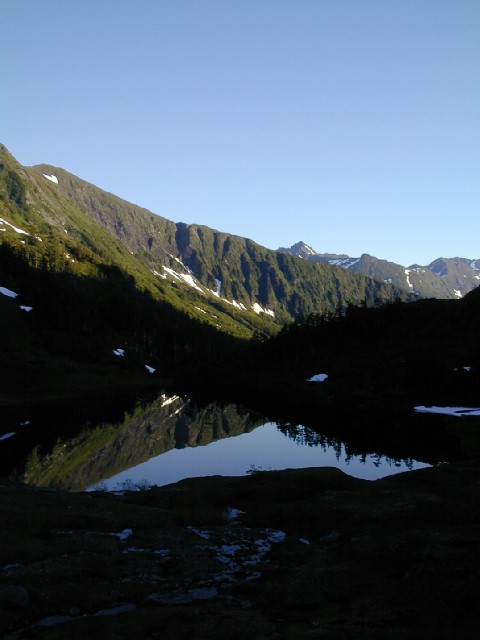 Morning Reflection on Camp Lake (49413 bytes)