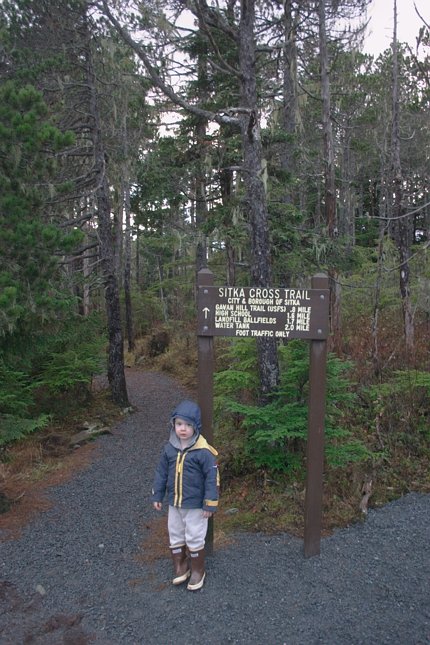 Connor and a Cross Trail Sign (88363 bytes)