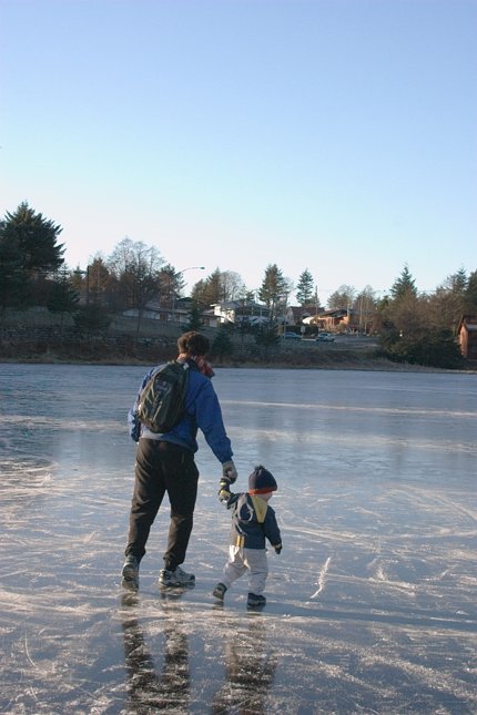 Connor and His Uncle Slide Across the Lake (53462 bytes)